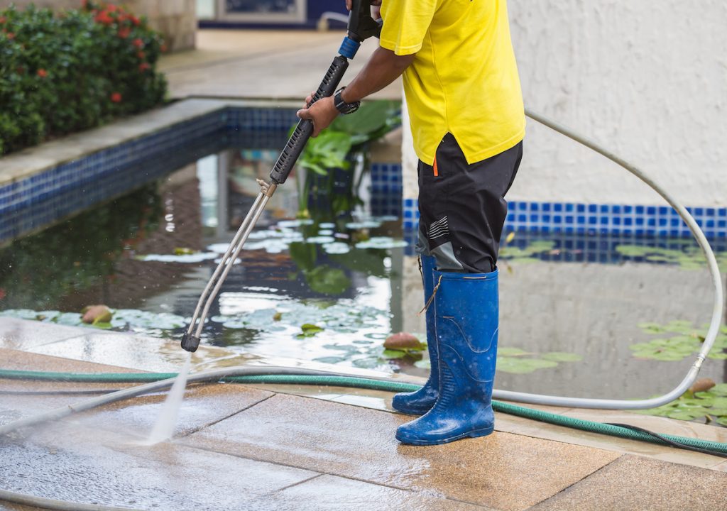 Should you pressure wash your driveway before sealing it?